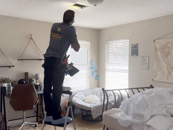 Free Air Duct Cleaning Estimate & Inspection in Houston | Mold, Dust - Healthy Environment Air Duct Cleaning Houston air duct technician inspecting air vents and HVAC ducts during a free home air quality evaluation.